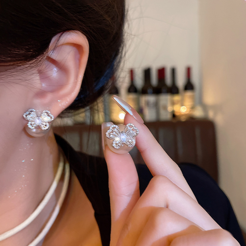 Silver exquisite hollowed-out butterfly stud earrings for women, light luxury, versatile and elegant, two-wear pearl earrings, high-end earrings details Picture