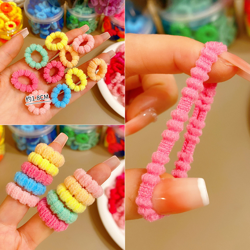 Colorful high-elasticity small towel bands for children to tie their hair without damaging it. Hair ties and rubber bands in ins high appearance level hair bands wholesale Application Scenario