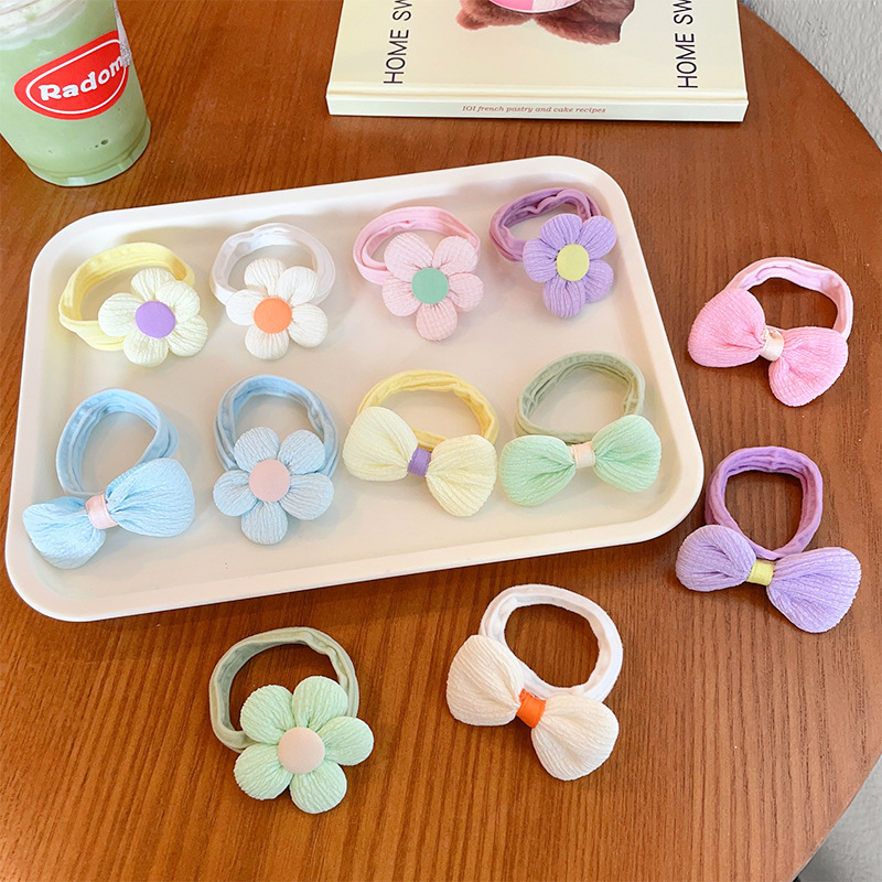 Children's hair ties are cute and won't hurt hair. They have good elasticity. Baby rubber bands, bows, flower towel loops, and little girls' hair bands Specification drawing