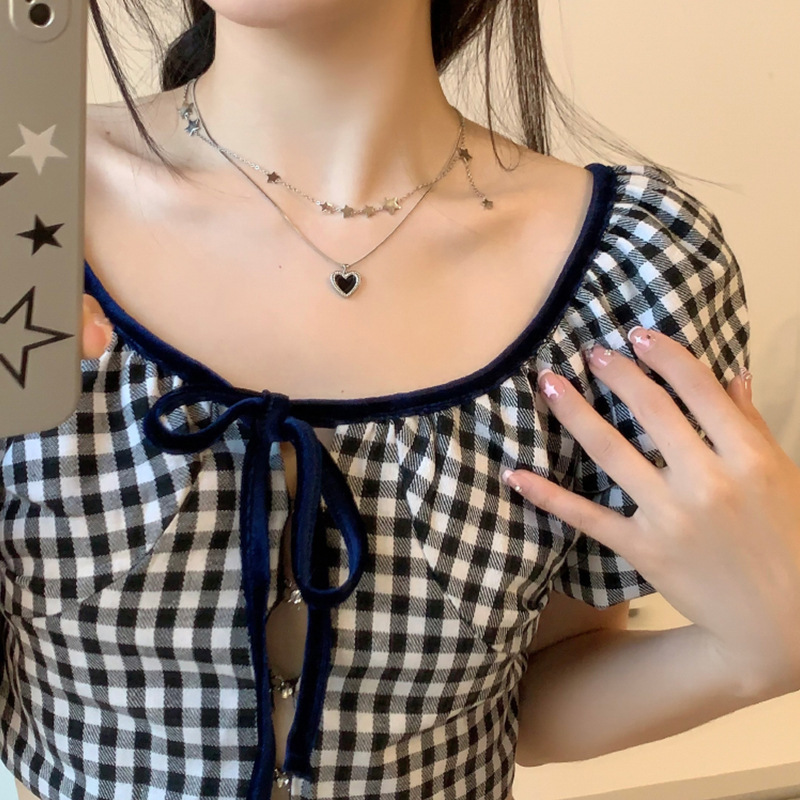 Star tassel heart necklace, a light luxury double-layer niche design for women, sweet and cool style collarbone chain, a high-end neckchain accessory full figure