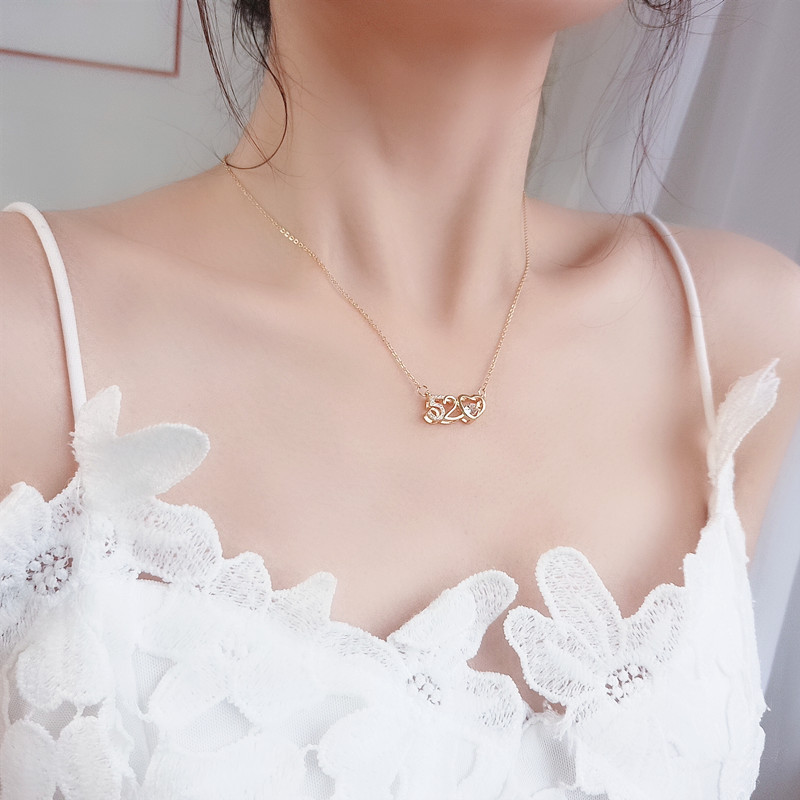 A fashionable new love pendant with a light luxury feel, a 520 titanium steel necklace with a female personality and trendy style, and a collarbone chain full figure