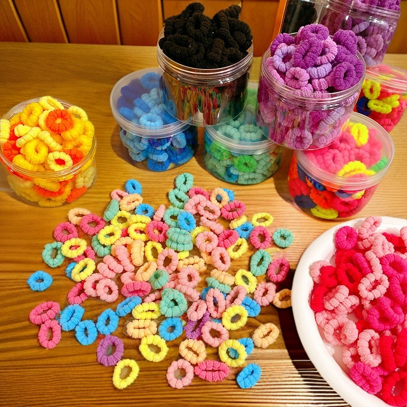 Colorful high-elasticity small towel bands for children to tie their hair without damaging it. Hair ties and rubber bands in ins high appearance level hair bands wholesale full figure