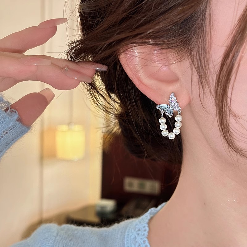 Blue micro-inlaid butterfly pearl stud earrings for women, 2025 new style earrings, niche design sense, unique tassel earrings Application Scenario