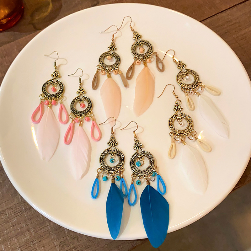 Bohemian ethnic style retro feather ear hook women's high-end and elegant long earrings, wholesale of popular earrings Application Scenario