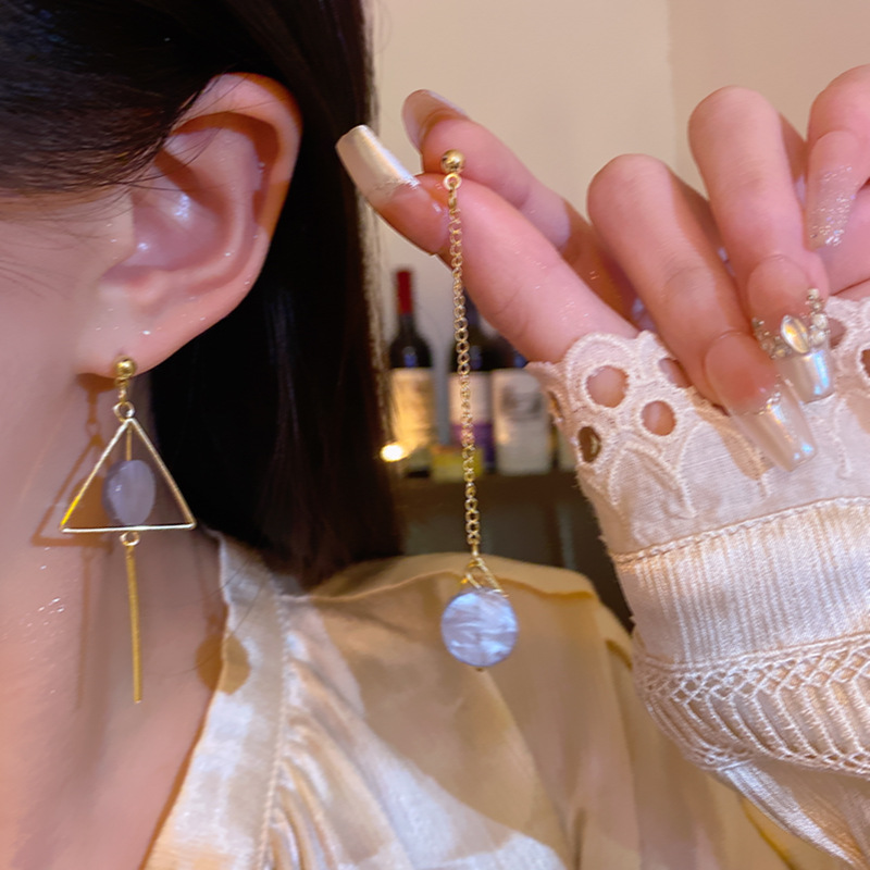 Asymmetrical triangular long tassel stud earrings, a unique and light luxury geometric earrings with a cold and unique design sense for women Application Scenario