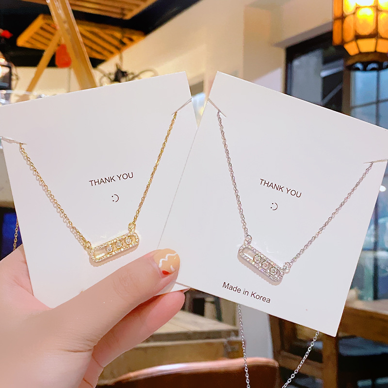 Fashionable and simple zircon titanium steel geometric necklace, a niche and light luxury accessory for women, a popular paperclip collarbone chain, and a high-end look full figure