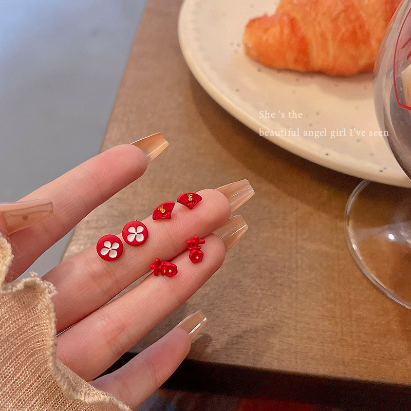 A festive red flower six-piece set of ear studs for women, new 2024 style, versatile, niche design, simple and elegant earrings wholesale full figure