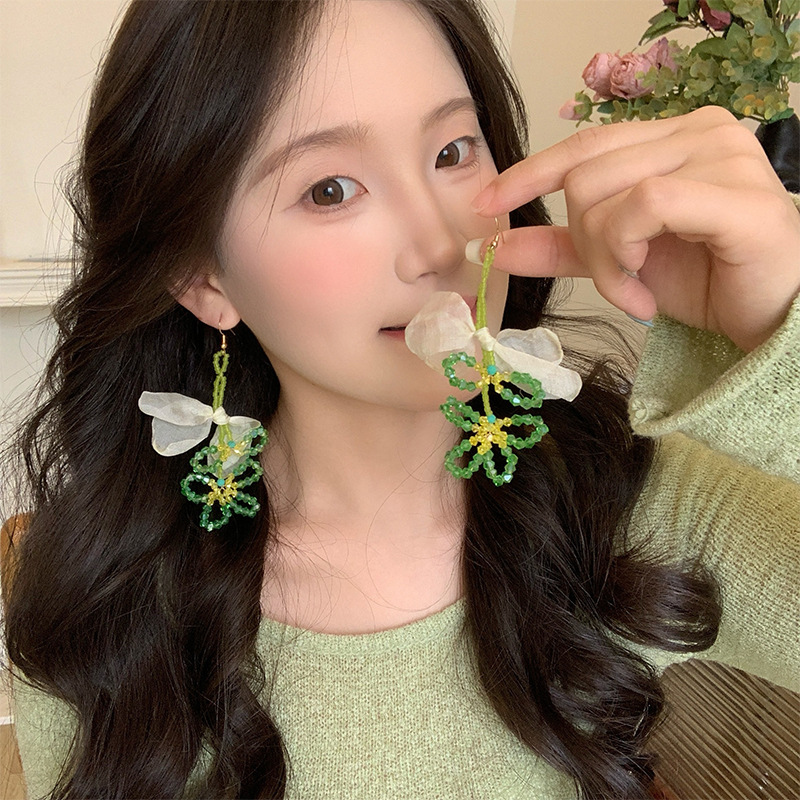 Forest-themed green crystal beaded flower earrings for women, a fashionable and fresh style with tassels and sweet stud design Application Scenario