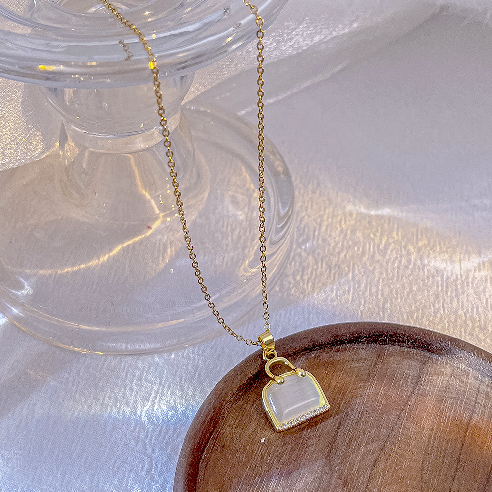 Stylish and elegant cat's eye stone bag, necklace, women's niche design sense, Internet celebrity collarbone chain, simple and versatile titanium steel jewelry Specification drawing