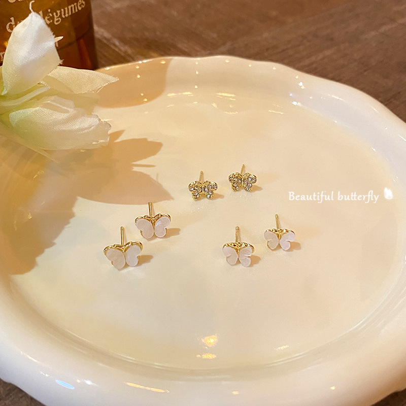 Wholesale of Korean diamond-encrusted mother-of-pearl butterfly ear studs for women, a light luxury, niche and high-end ear-piercing six-piece set of earrings and earrings Specification drawing