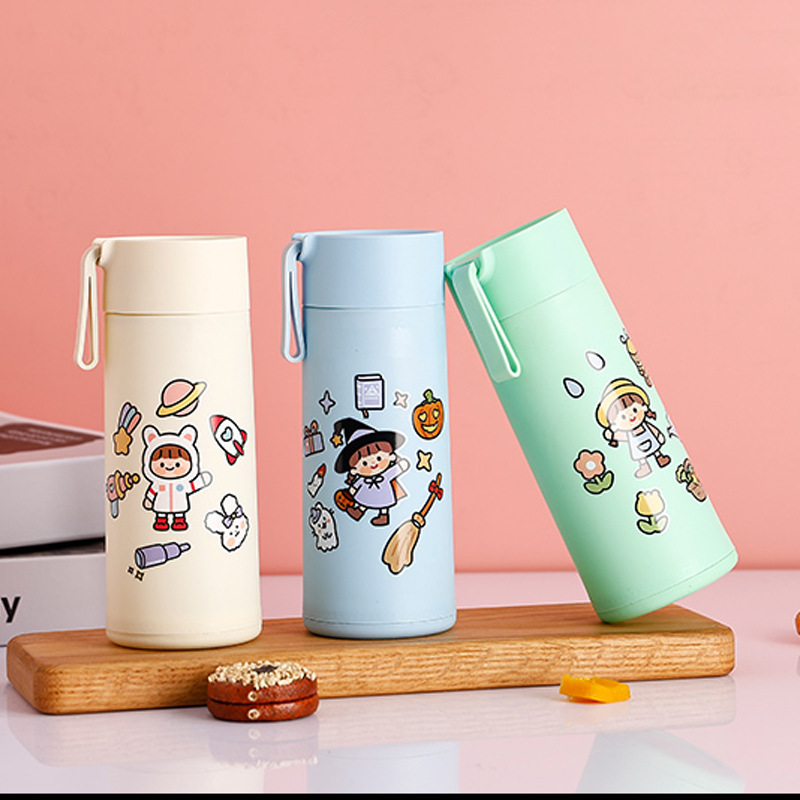 Cartoon glass water cup with a handle, double-layer heat-insulating glass water cup, cute children's portable cup, ground promotion gift cup Application Scenario