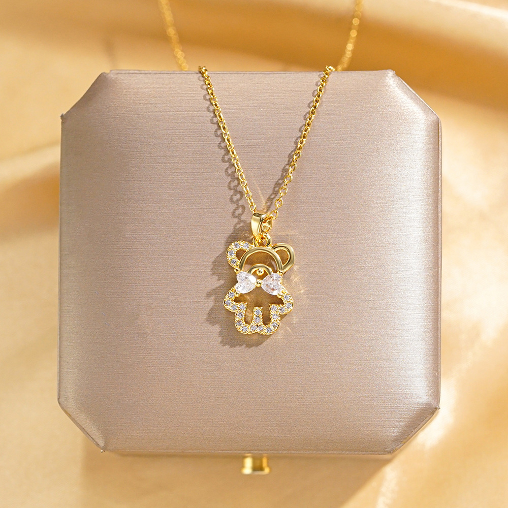 The new Korean version full diamond bear necklace is a unique and stylish collarbone chain that is popular on Instagram for women. It is a rare and versatile light luxury accessory full figure