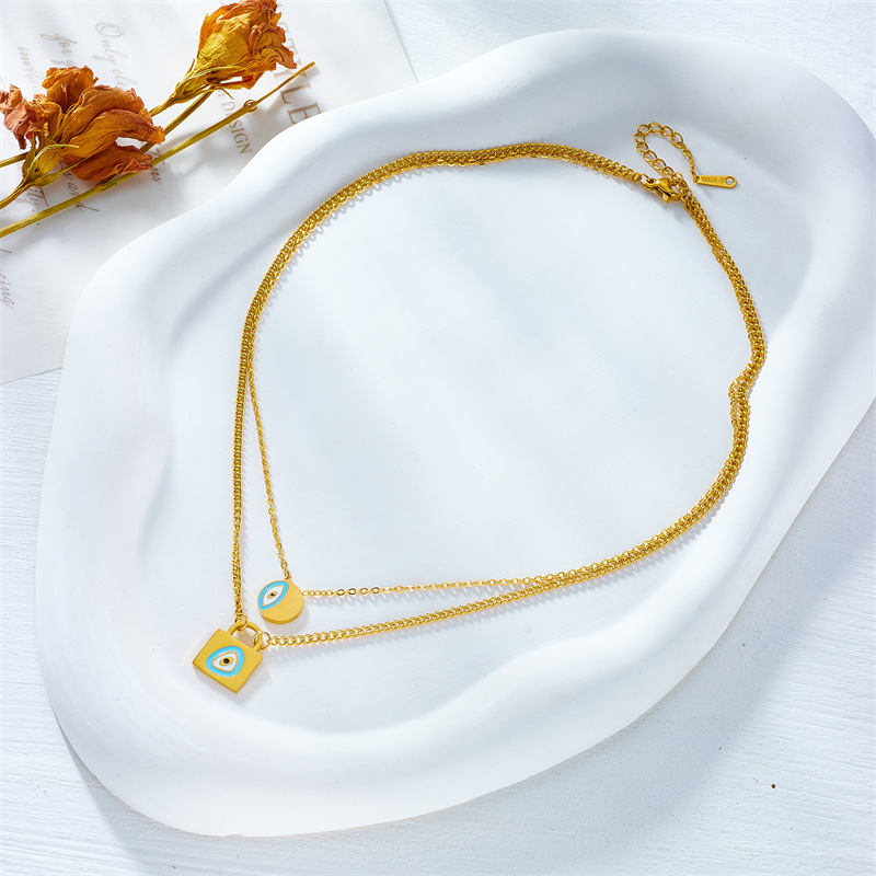 European and American fashion, niche design, simple and individual titanium steel oil drip lock head, round eye pendant, double-layer chain necklace Specification drawing
