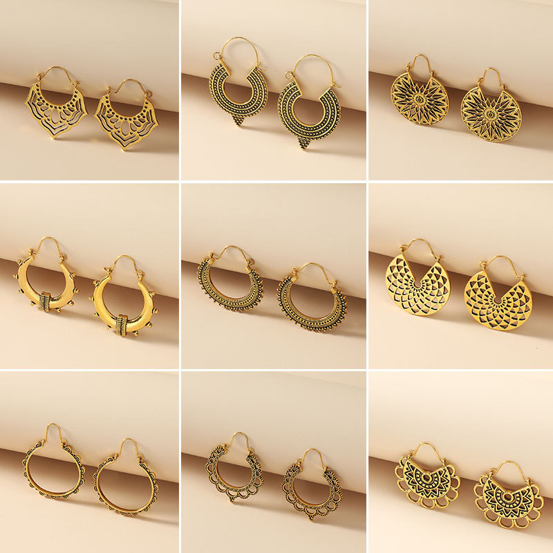 European and American InS-style hollowed-out carved earrings with feminine charm, alloy geometric ear buckles, exaggerated irregular round earrings for women full figure