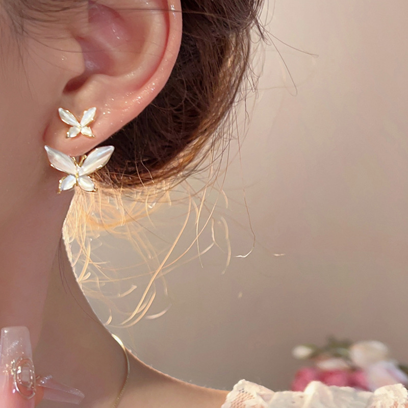 French-style high-end glazed butterfly stud earrings for women, a new 2025 forest-themed gentle and elegant earpiece details Picture