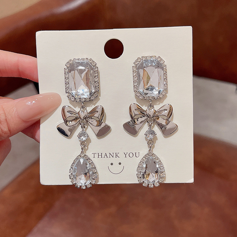 Exaggerated geometric bow-shaped rhinestone earrings, women's light luxury long exquisite stud earrings, high-end and elegant earrings and earrings Specification drawing