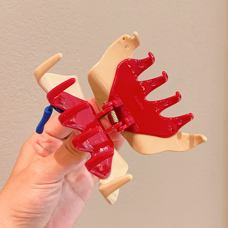 Designer button clip, fashionable and elegant red hair clip, color-blocked hair clip, semi-tied shark clip, hair grab headwear Application Scenario