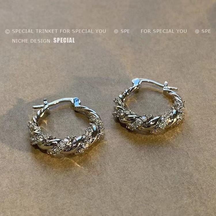 High-end wrapped diamond ear buckles for women, light luxury, niche and unique personality ear studs, fashionable bestsellers, retro earrings wholesale details Picture