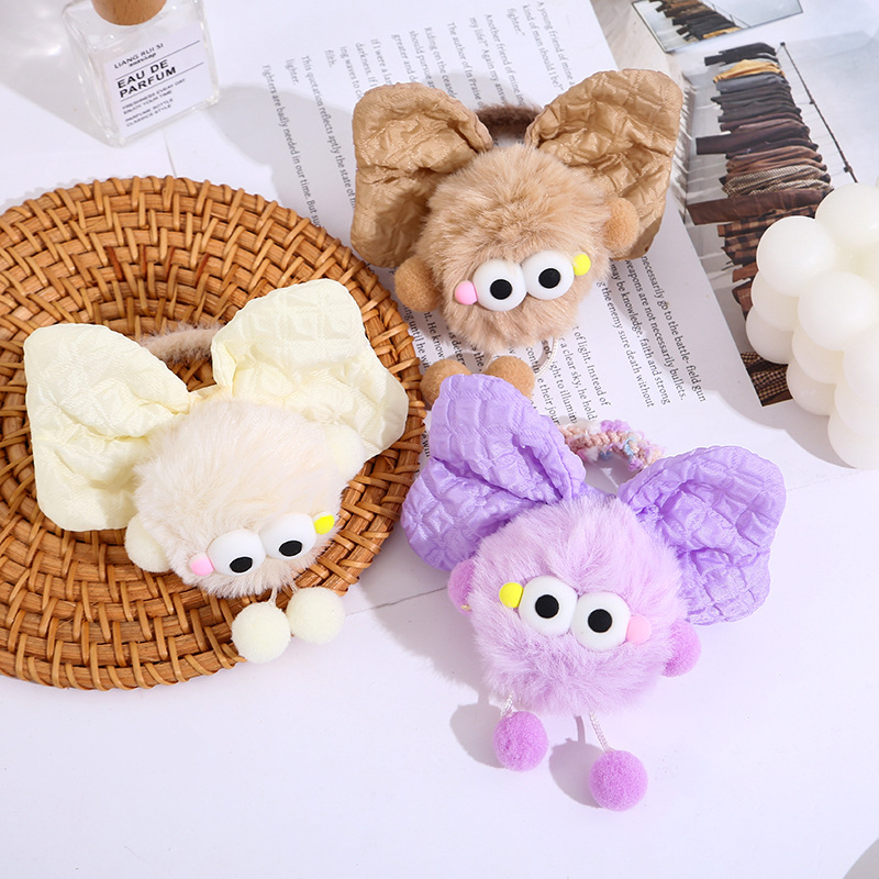 The cute plush ball hair tie for girls' hair ties won't damage hair. New style hair band for autumn and winter 2024 details Picture