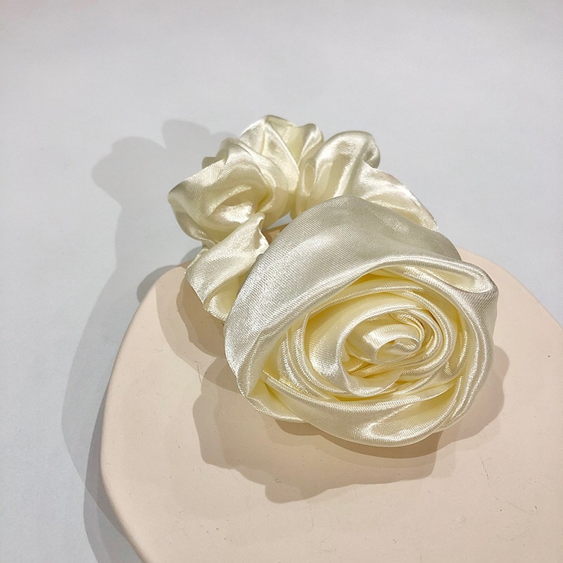 Rose hair tie, three-dimensional flower large intestine hair tie, ins retro artistic school style, satin flower high-end hair accessory Application Scenario