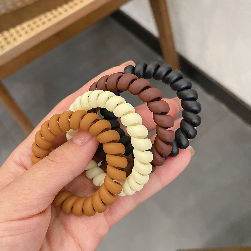 The autumn and winter milk coffee-colored telephone line hair band, women's seamless hair tie, simple hair tie rubber band, hair tie and headwear are versatile Specification drawing