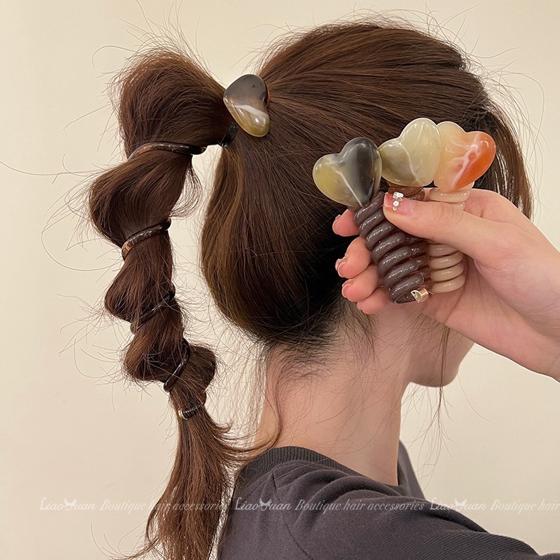 Japanese-style simple bubble braid hair tie for women, 2025 new style, high-end feel, heart-shaped telephone line hair tie, ponytail braiding tool Application Scenario