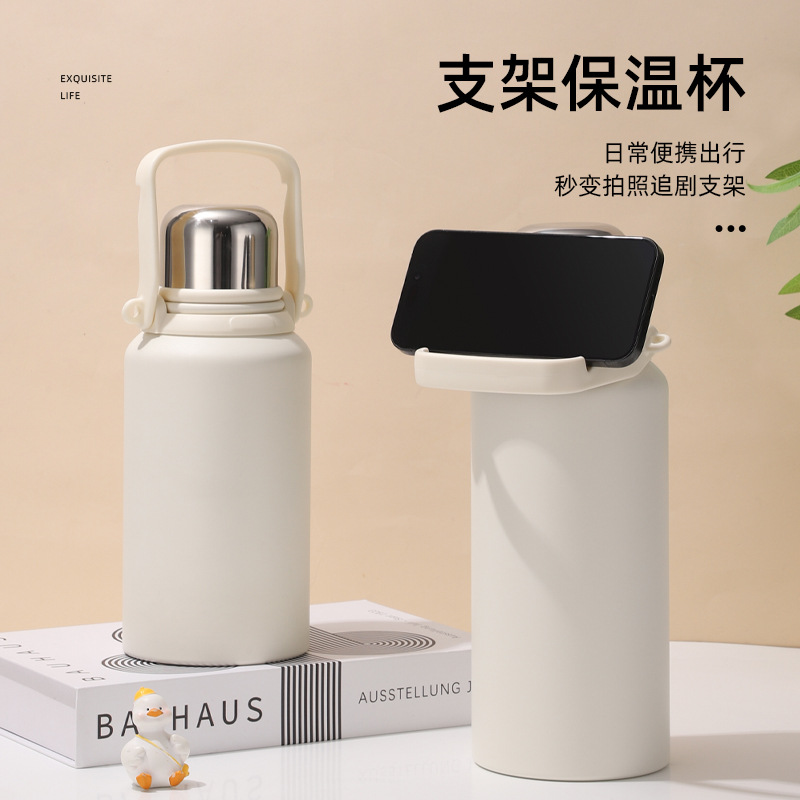 Outdoor large-capacity, high-appearation-level 304 stainless steel insulated cup, tea-water separation double-drinking cup, portable sports water bottle full figure