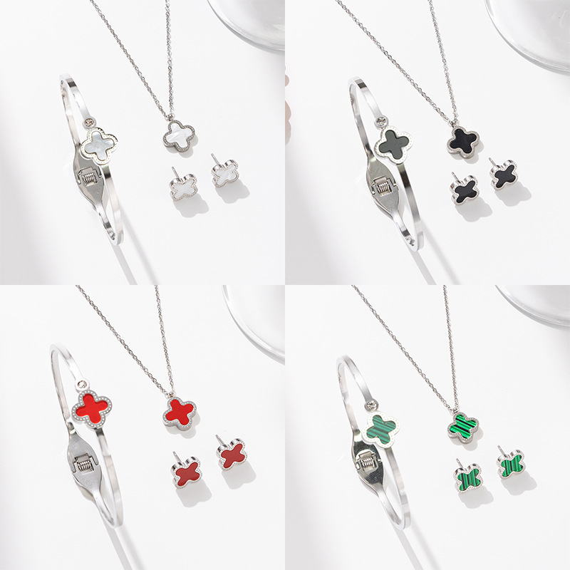 Silver stainless steel natural color four-leaf clover set, fashionable and versatile necklace, women's bracelet, stud earrings, three-piece set, cross-border accessories full figure