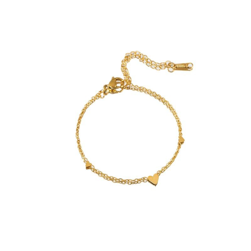 This non-fading titanium steel simple heart-shaped necklace and bracelet set is fashionable and versatile. It's a niche collarbone chain and a trendy and elegant accessory Item Picture