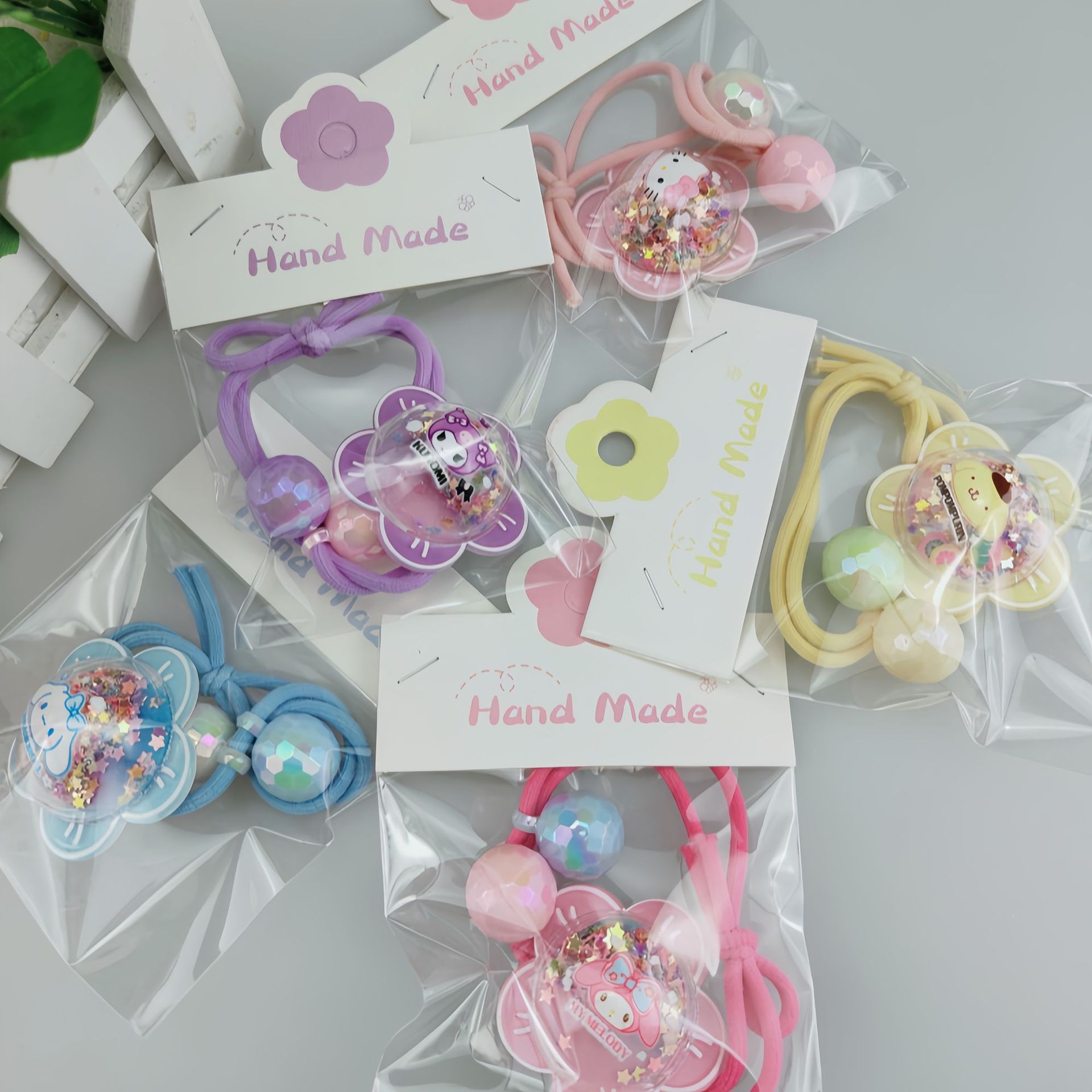 The 2024 new Sanrio sweet hair band, high ponytail leather band, girls' hair band, Kuromi Hair, a popular children's hair band details Picture
