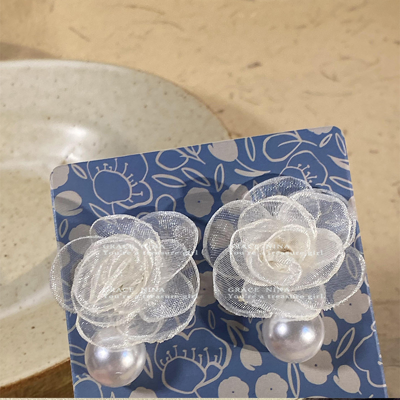 French camellia pearl stud earrings for women, exuding a sense of light luxury and high-end elegance. Forest-themed earrings, a new bestseller in 2025 details Picture