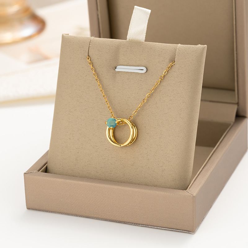 A genuine gold electroplated blue cat's eye stone double-ring interlaced necklace for women, a simple round pendant with a high-end feel, titanium steel collarbone full figure