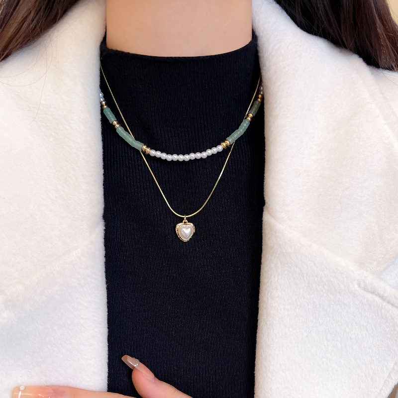 Double-layer pearl heart-shaped necklace, a trendy and versatile sweater chain for women on Instagram, with a high-end and light luxury collarbone chain accessory details Picture