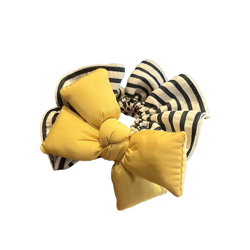 Dongdaemun's new lemon-yellow bow large intestine hair tie is a versatile striped and cute girlish hair tie accessory Item Picture