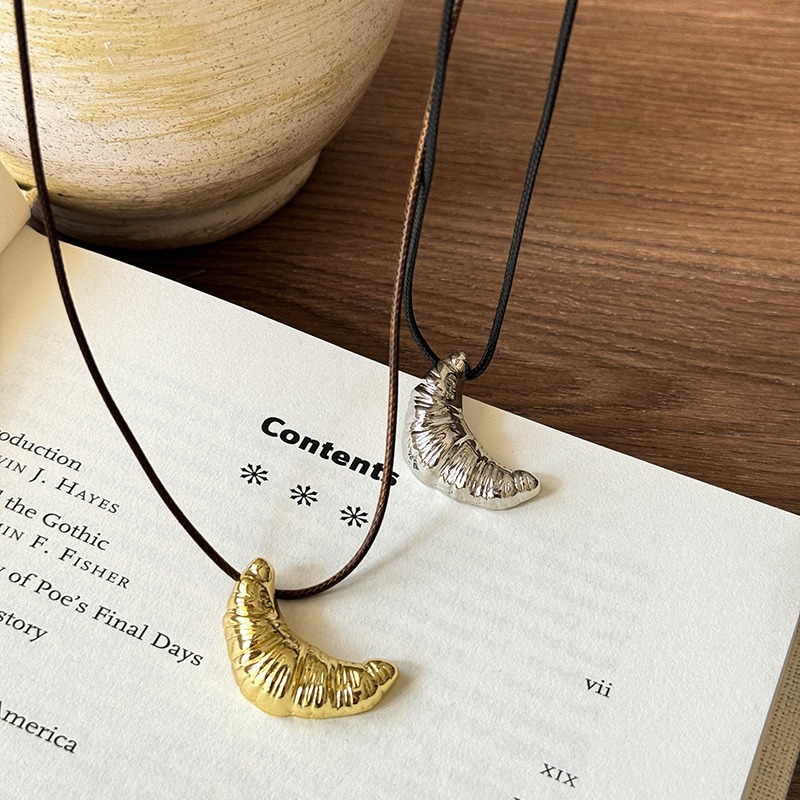 Korean croissant black leather rope necklace for women 2024 new style, versatile and elegant long sweater chain collarbone chain accessory details Picture