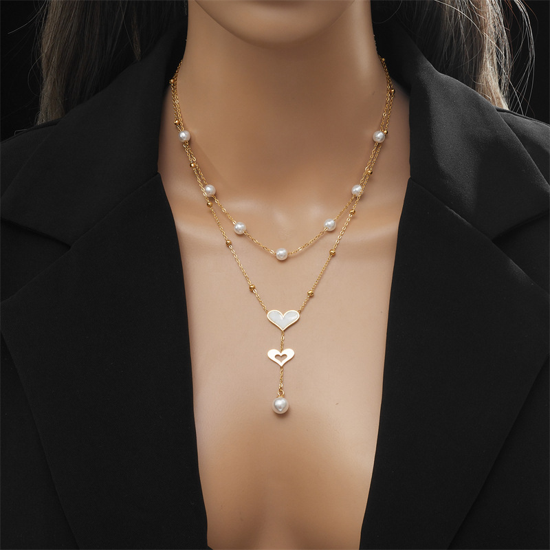 European and American fashion, niche and retro double-chain pearl butterfly tassel pendant necklace details Picture