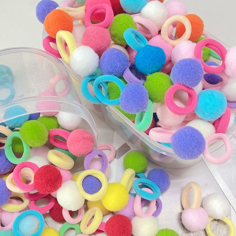 The girl's colorful pom-ball hair band is super cute. The new rubber band is a lovely hair band for kindergarten girls with high bounce and elasticity Application Scenario