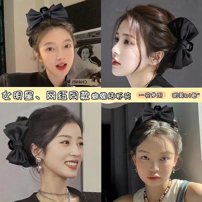 A black double-sided Korean-style large bow hair accessory with a hairpin on the back of a woman's head details Picture