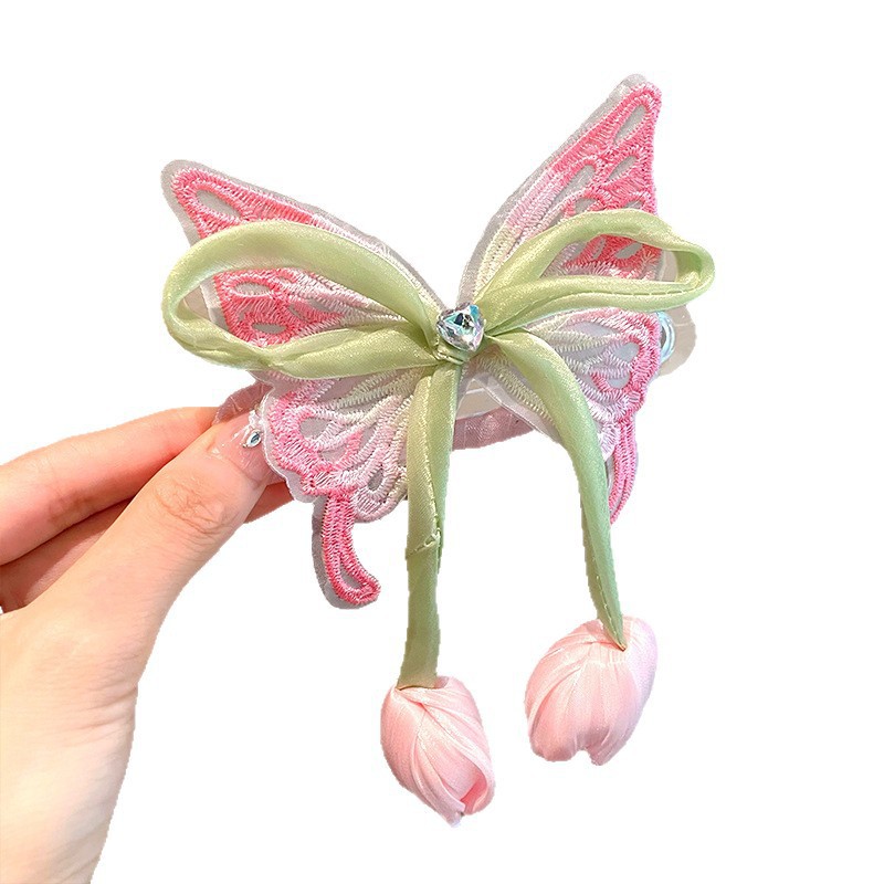 The new children's super fairy tulip butterfly hairpin, the back of the head ponytail clip, the girl princess hair accessory, is very stylish Item Picture