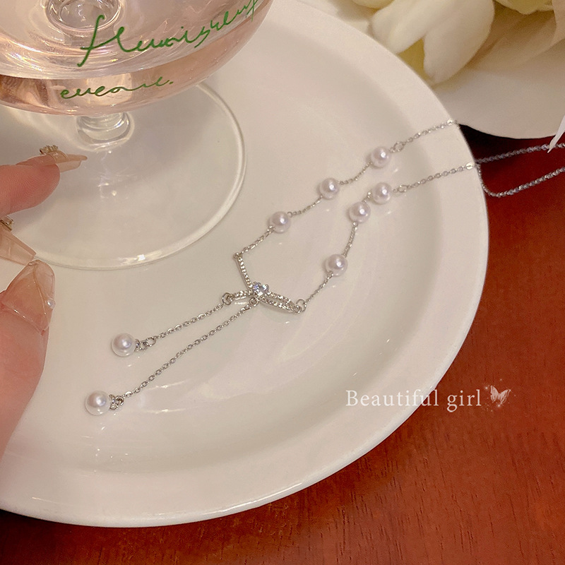 Bow pearl tassel necklace, women's light luxury, niche and high-end collarbone chain, neck chain accessory, autumn and winter sweater chain Specification drawing