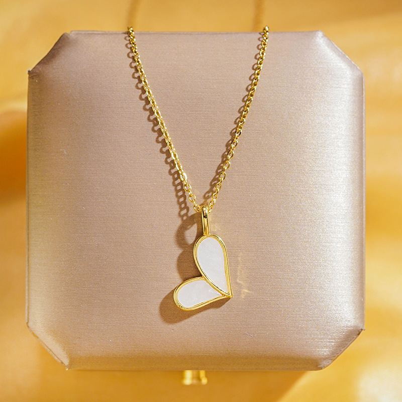 A white mother-of-pearl heart-shaped necklace with a unique design sense for women, a diamond-encrusted heart-shaped pendant, and a trendy light luxury style fashionable collarbone chain details Picture