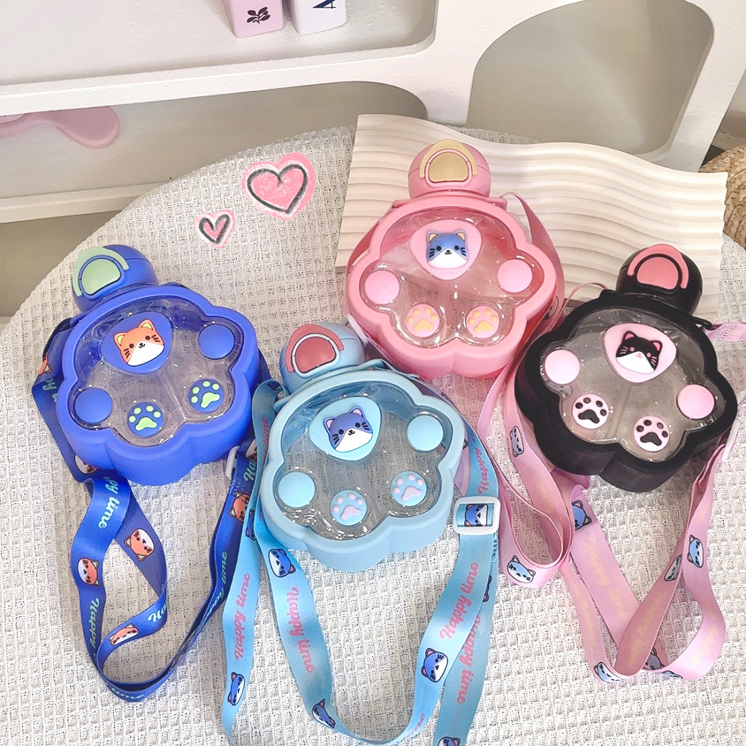 Wholesale of 2025 new cat-paw plastic cups, cute and fun children's straw cups, portable outdoor slanted cat water cups details Picture