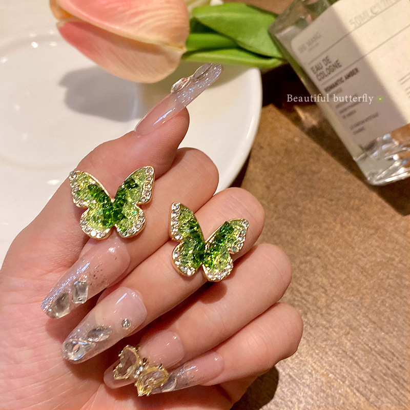 Forest-themed green crystal butterfly earrings for women, summer French retro gradient stud earrings, elegant and high-end, popular earrings full figure