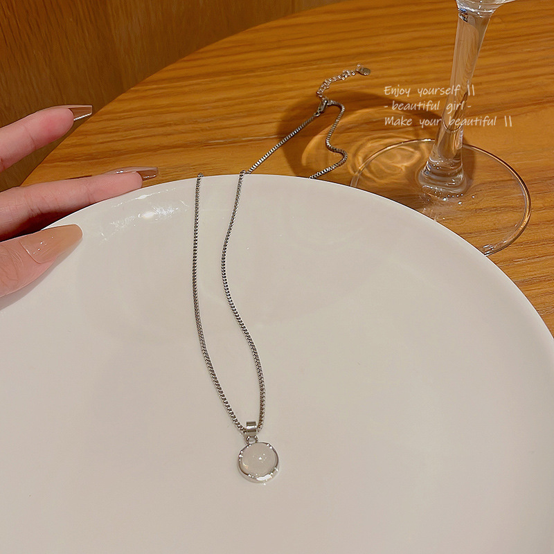 A new minimalist moonstone titanium steel necklace from South Korea, featuring an Instagram-style, light luxury and versatile style. It's the same as the popular collarbone chain Application Scenario