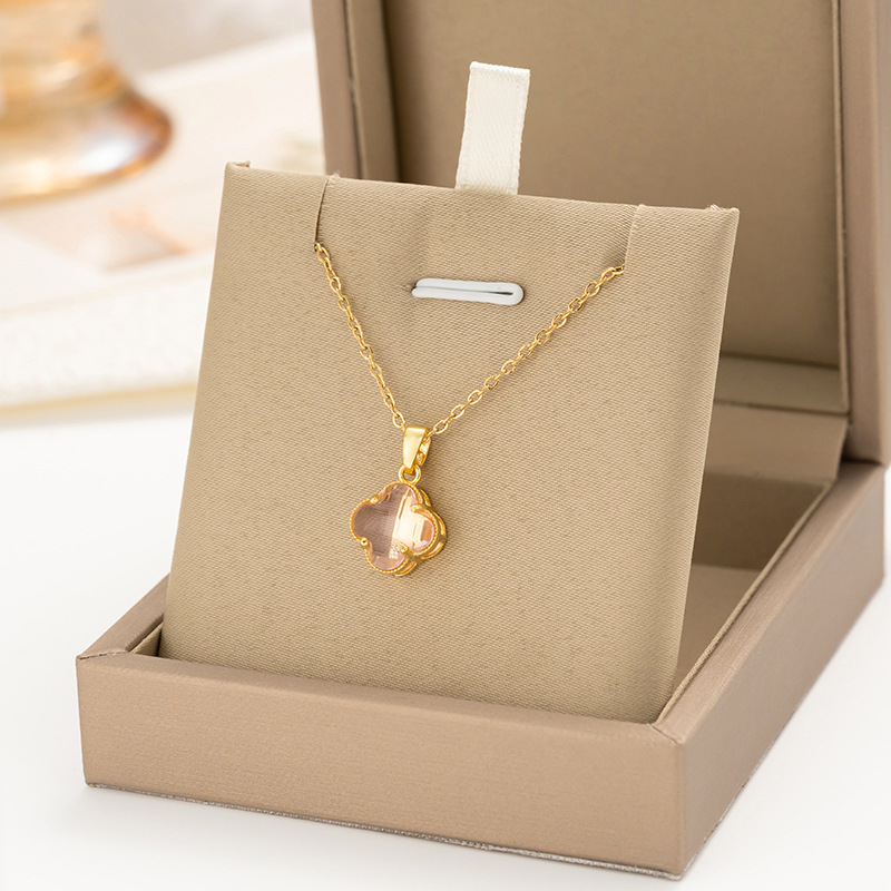 This genuine gold electroplated pink crystal four-leaf clover titanium steel necklace exudes a fashionable, simple and light luxury feel for women. It is a versatile collarbone chain accessory details Picture