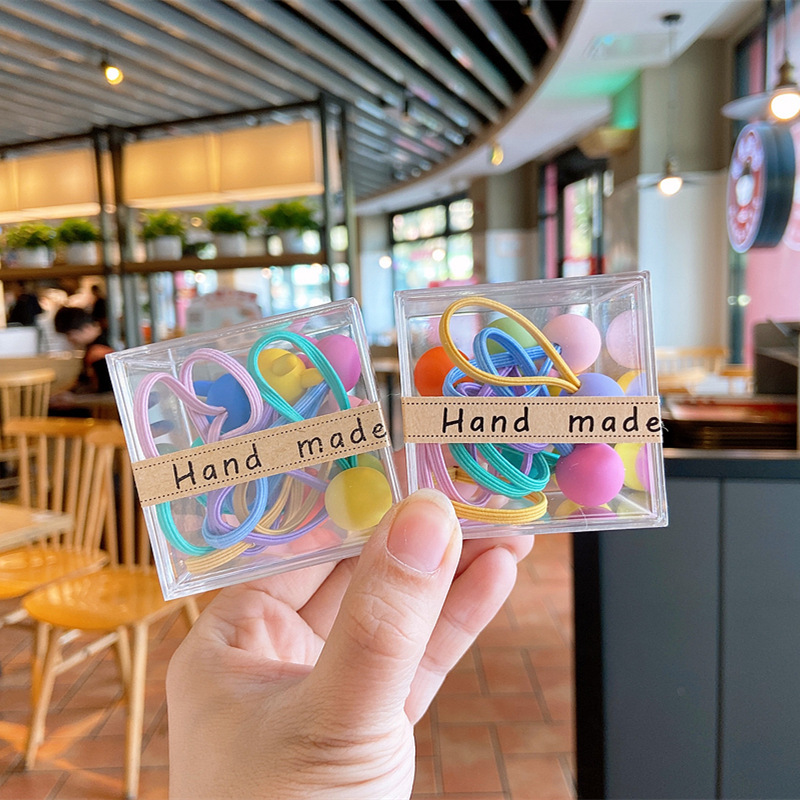10 sets of children's high-elasticity candy-colored heart-shaped baby hair accessories, colorful fluorescent bright-colored hair ties and cartoon hair ties Application Scenario