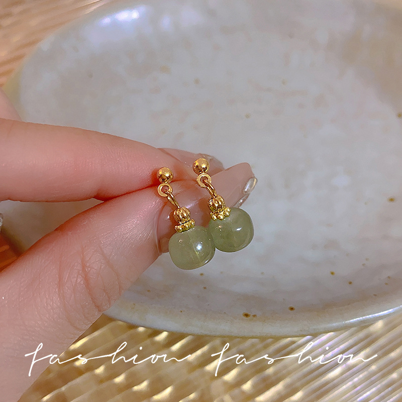 Retro jade earrings for women, with a light luxury and high-end feel, unique temperament. 925 silver needle, versatile and simple stud accessories full figure