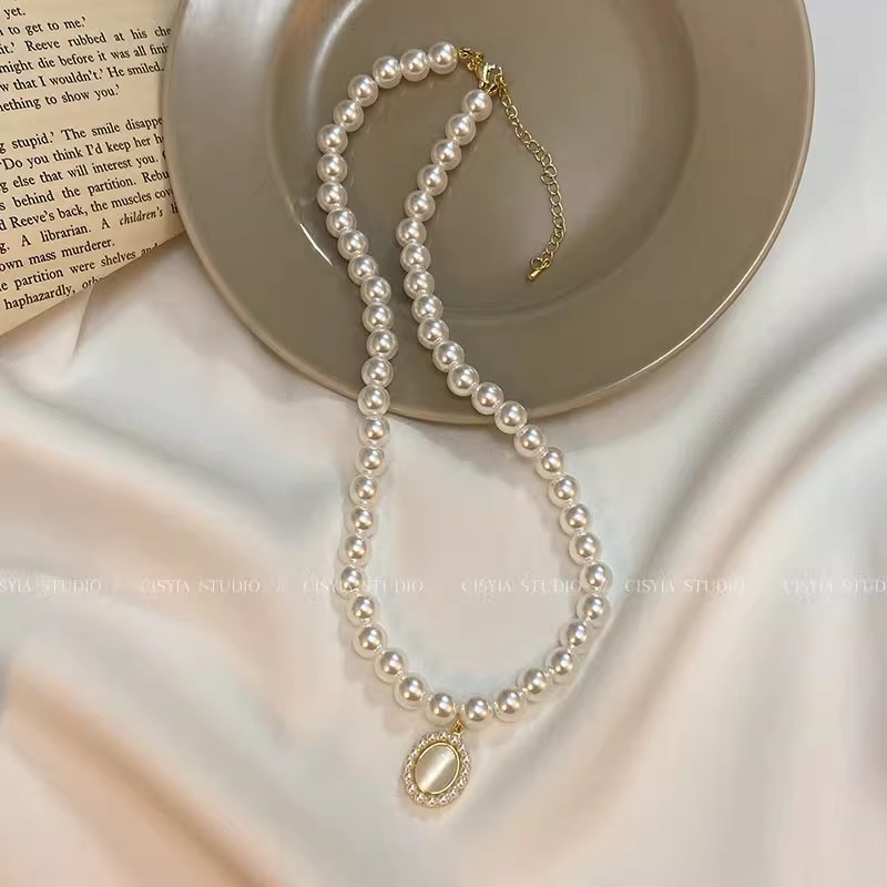 French retro cat's eye pearl necklace, women's light luxury, niche and high-end collarbone chain, best-selling accessory wholesale Specification drawing