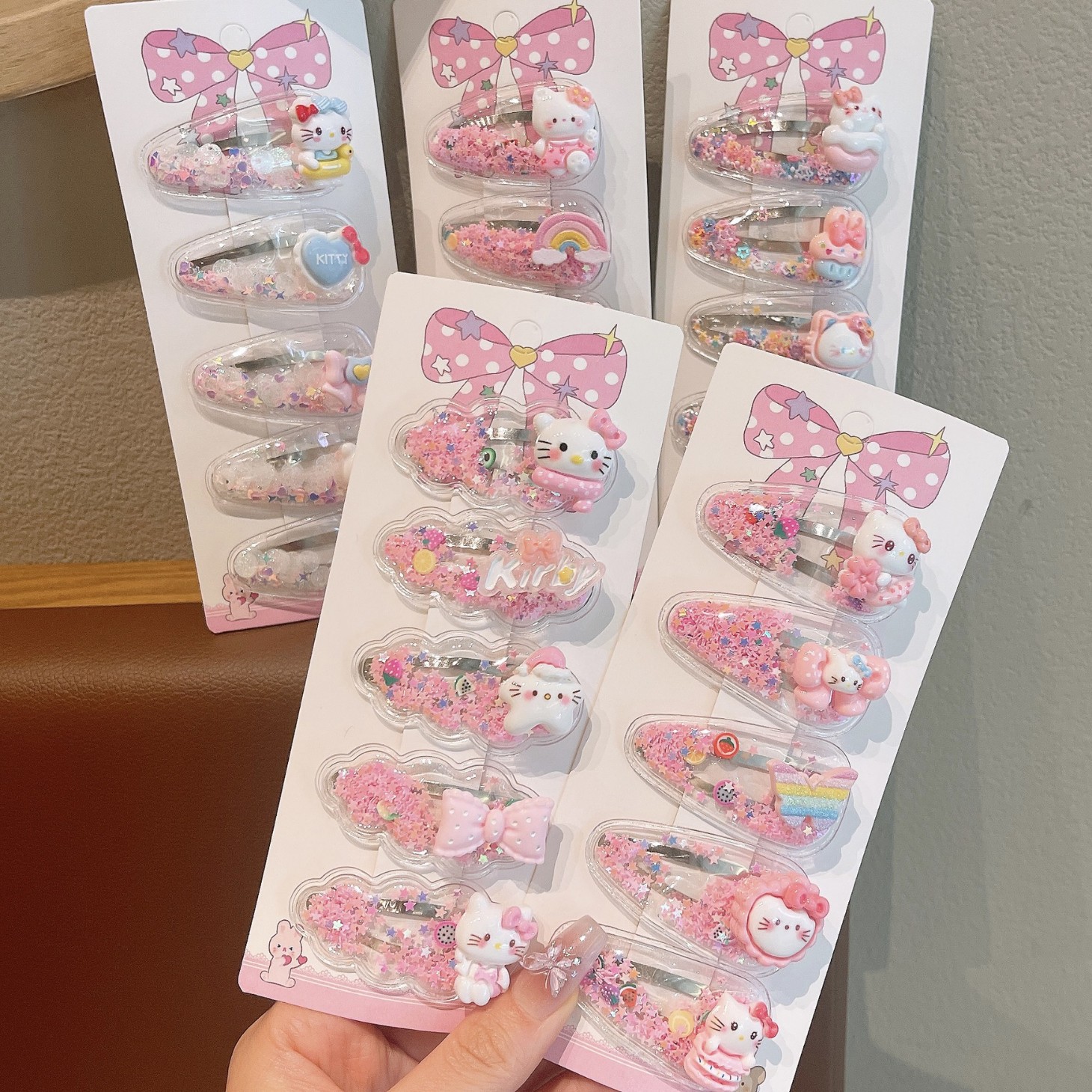 Children's flowing sand hair clips, cute little girl cartoon cat hair clips, Sanli student hair clips, wholesale clips at a stall details Picture