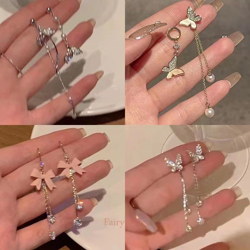 S925 Silver needle micro-inlay exquisite asymmetrical fishtail earrings, high-end design sense, long tassel butterfly stud earrings full figure